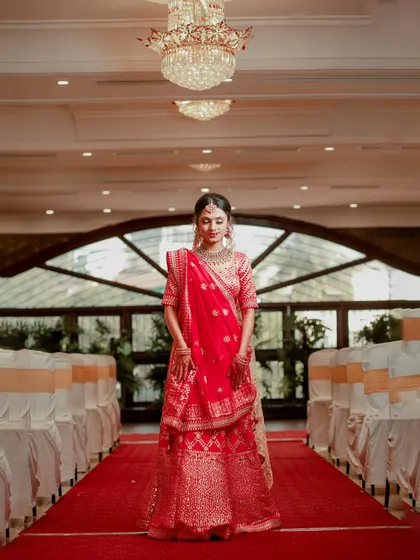 The bride's grand entrance down the aisle, a stunning portrait that captures the elegance of the moment.