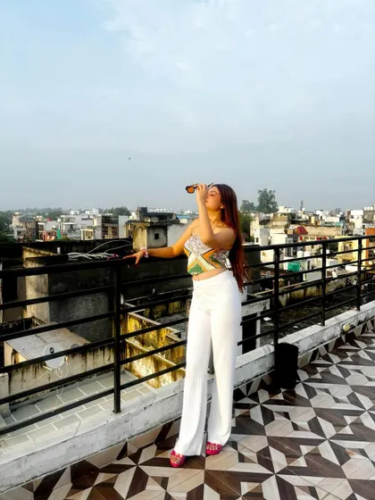 Soaking up the sun on a rooftop. Finding beauty in the simple, everyday cityscapes.