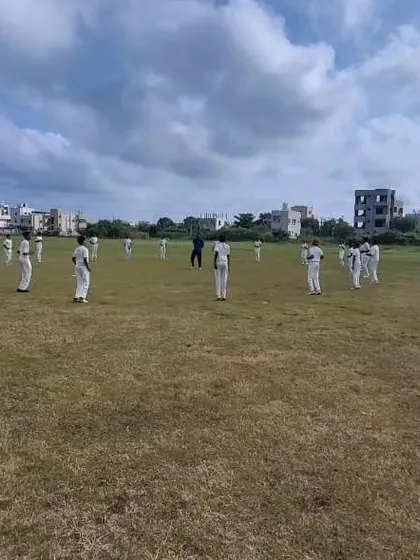 A wide shot of the field setting during a match on our Hubli tour.