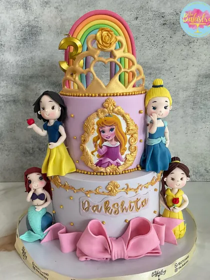 A cake fit for royalty! I loved assembling this magical princess cake for Dakshita, featuring handcrafted figures of her favorite characters like Snow White, Ariel, and Belle.