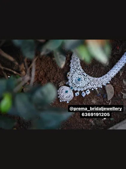 Another artistic shot of the AD necklace and earrings.
