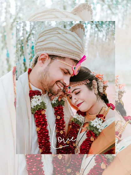A sweet and tender moment between the couple at their wedding, their foreheads touching in a gesture of love and unity.