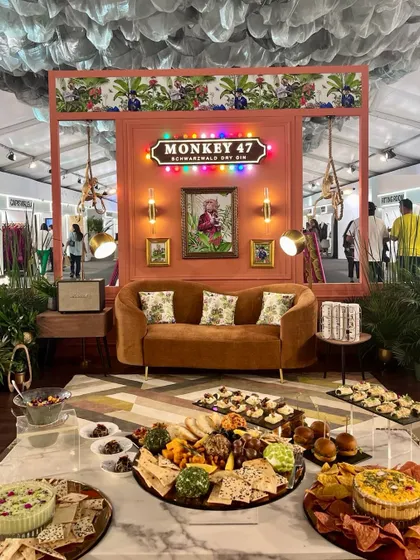Our grazing table set up for the Monkey 47 brand experience, where the food and decor create a whimsical and inviting atmosphere.