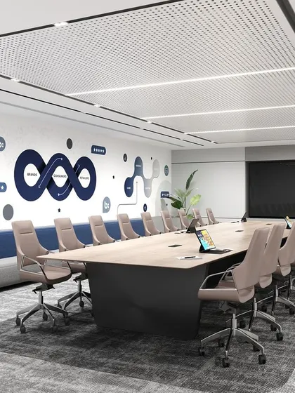 A large, modern boardroom designed for impactful decision making. Featuring a custom conference table, integrated technology, and brand-centric wall graphics, the space combines professional aesthetics with complete functionality.