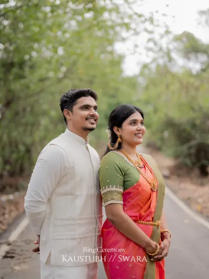 A classic portrait of the engaged couple looking towards the future together, captured during their outdoor photoshoot.