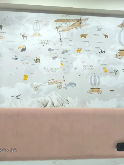 A world map mural for a child's room, featuring cute animals and illustrations. This design is both educational and imaginative.