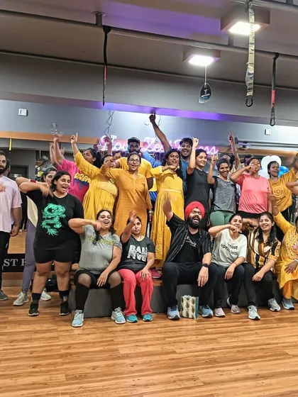 A large group photo showing the diverse and energetic community at Zest Fitness. We celebrate our fitness journey together, making every achievement a shared success.