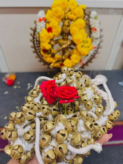 A beautiful shot of the 'gejje' offered at the altar before being given to the students.