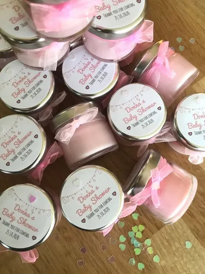 These pink candles were made for Donna's baby shower. The custom labels and pink ribbons perfectly matched the "It's a girl" theme.