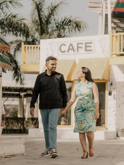 A casual and happy walk through a street set with a cafe, capturing a relaxed "day out" vibe.