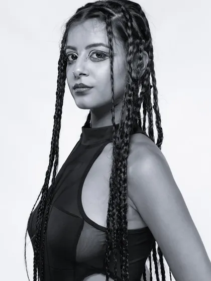 A classic three-quarter portrait in black and white, a staple for any model's book.