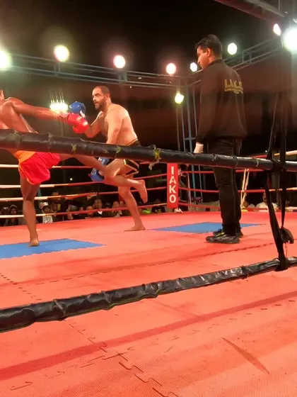 A perfectly timed kick exchange during the IAKO National Pro Kickboxing Championship. This is high-level striking in action.