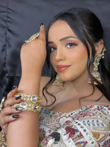 A closer look at this Mehndi Barbie look. The eye makeup is soft and blended, and the skin is glowing, perfect for a daytime event.