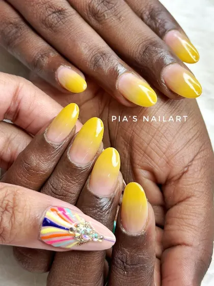 Yellow fellow. A bright and sunny yellow airbrush ombre, perfect for adding a pop of color to your look.