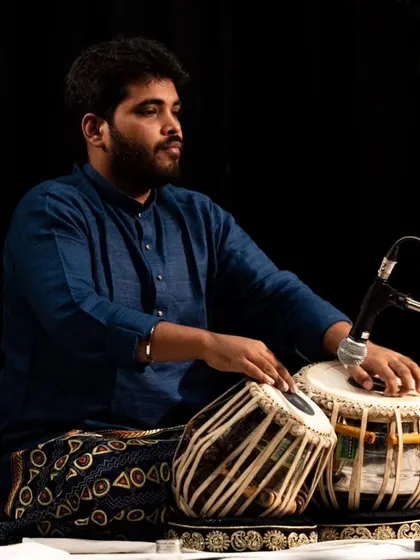 A moment of focus during my performance at the India International Centre, Delhi.