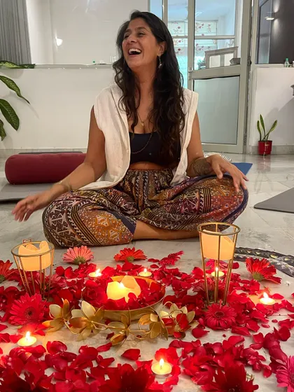 The joy and laughter that fills our space during a women's circle. The candles and flowers create a warm, inviting atmosphere for sharing and connection.