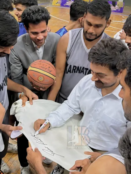 A truly special moment for our players as Aamir Khan signs a jersey on set. You can see me standing by, proud to see our athletes getting this incredible experience.