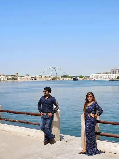 A stunning view of the Dubai skyline from across the water. This shot establishes the sense of place and the grand scale of a destination shoot in this iconic city.