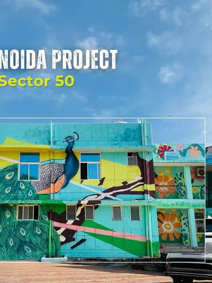 The final view of another large-scale community center project in Noida's Sector 50. This facade features a magnificent peacock, our national bird, with its feathers spreading across the wall.