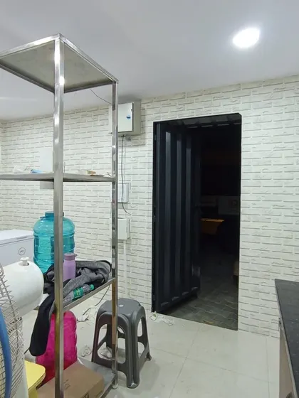 Another view of the white brick wallpaper in the kitchen.