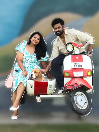 A stylish couple and their adorable beagle enjoying our iconic scooter photo prop. Making memories with your paw-squad is what it's all about.