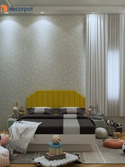 A stylish kids' bedroom with a bright yellow channel-tufted headboard. The neutral wallpaper and soft rug create a comfortable and inviting space for play and rest.