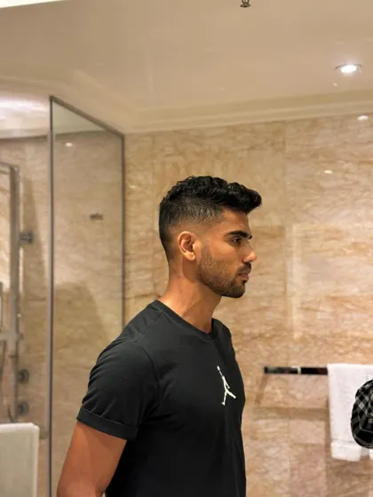 A profile view of Rajvardhan Hangargekar's fade.