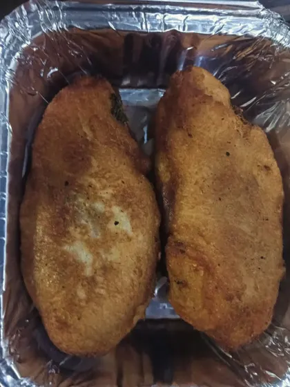 A close-up of my homemade bread rolls, fried to a perfect golden brown.