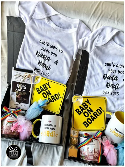 A rainbow-themed pregnancy announcement for the whole family, featuring custom onesies, mugs for 'Great Grand Dadi' and 'Mama', and colorful treats.