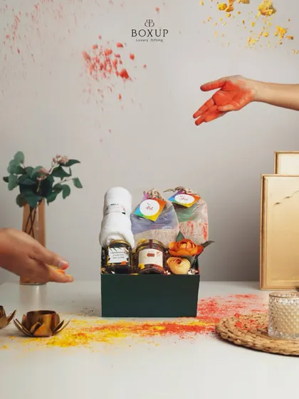 Celebrate the colors of joy with our vibrant Holi hampers. This gift box is packed with festive treats and organic colors, perfect for sharing happiness with friends and family.
