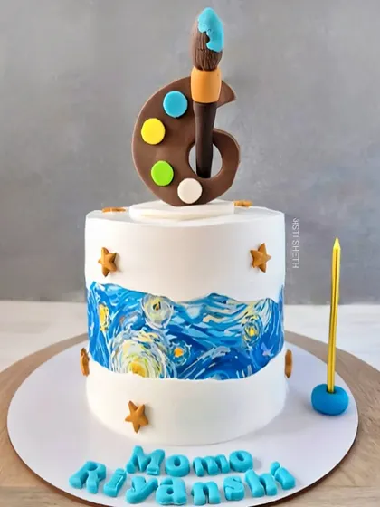 A creative art-themed cake for a 6th birthday, featuring an edible print of "Starry Night" and a handcrafted chocolate paint palette.
