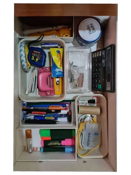 I love breaking down a big job into small, doable chunks. This stationery drawer was a small win that made a big difference. Notice how I reused old iPhone boxes as free drawer dividers.