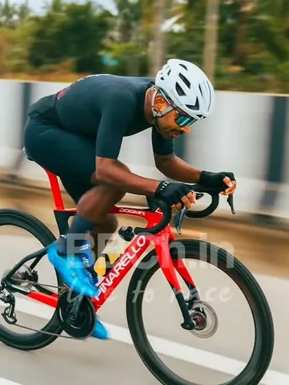 An elite rider on a high-performance Pinarello bike, demonstrating the serious level of competition at our events.
