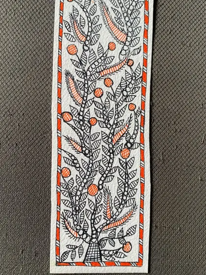 Another intricate Madhubani bookmark, this time with a 'Tree of Life' motif. The fine line work and delicate coloring showcase the student's growing skill.