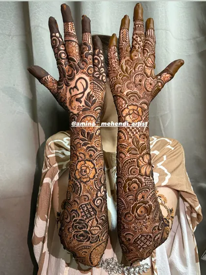 A full view of the design featuring the Om symbol and a heart with initials, blending spiritual and romantic elements.