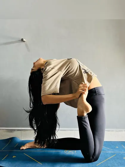 Perfect practice makes progress. Here I am in a variation of Eka Pada Rajakapotasana, or One-Legged King Pigeon Pose. This is an advanced backbend and hip opener that requires a lot of flexibility.