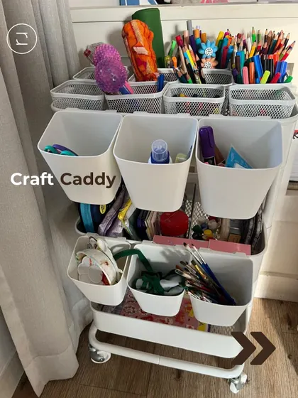 A mobile craft caddy is a fantastic solution for containing art supplies. Pens, paints, and paper are all organized and can be easily moved around, encouraging creativity without creating a huge mess.