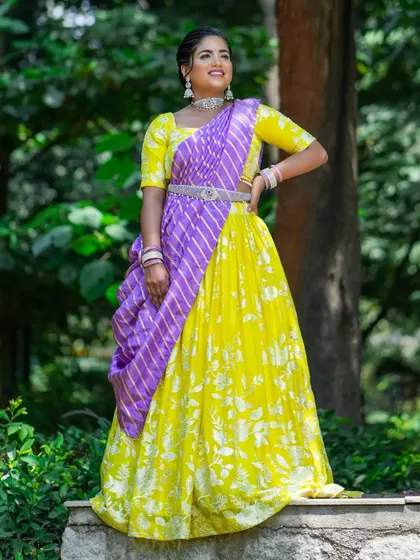 Celebrating joy and positivity with this radiant yellow and purple half saree for Navaratri Day 1.