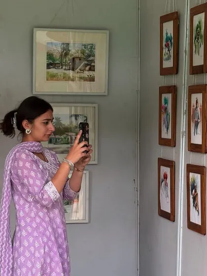 A collection of photos from various art exhibitions and fairs I've participated in, including the National Exhibition of Art and the Jaipur Kala Mela. It's an honor to have my work displayed in these prestigious venues.