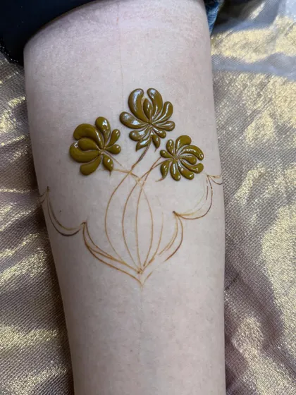The initial outline for the floral bouquet. This shows how I start with a light sketch before filling in the bold details.