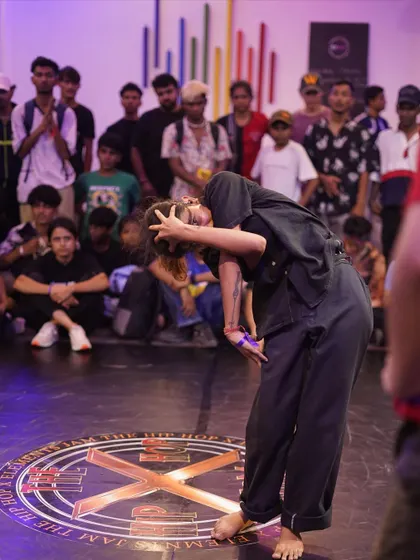 A b-girl expresses herself through movement on the dance floor. We encourage individuality and self-expression in all our battle categories.