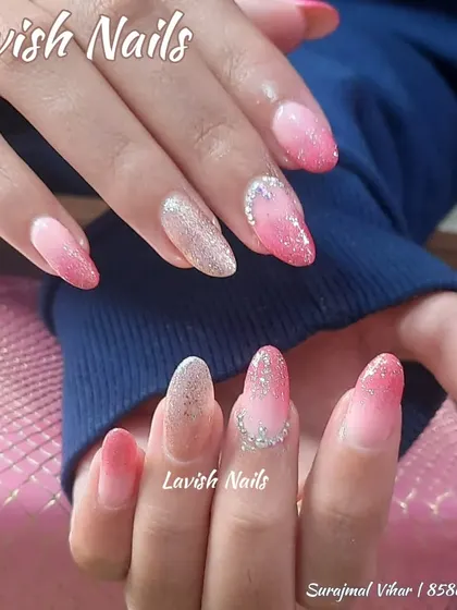 A beautiful overlay on natural nails combining a pink ombré gradient with a silver glitter fade and delicate crystal accents.