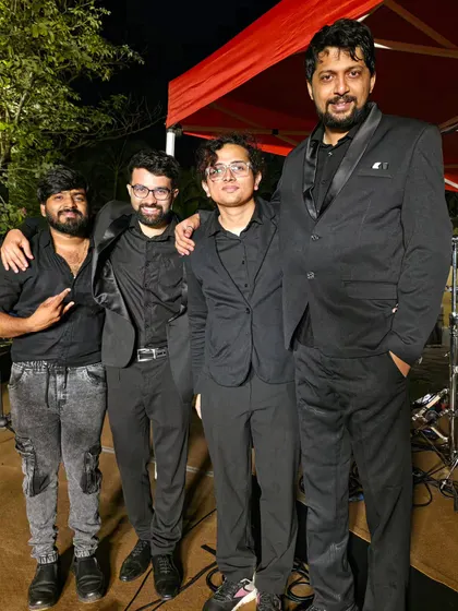 We stand together in a band portrait shared as Rishi prepared to leave for his music studies in the UK.