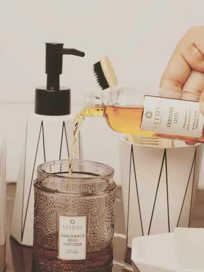 For lovers of Oud, our Persian Oud reed diffuser is a must-have. Here, the fragrance oil is being poured into the hand-cut glass vessel, ready to fill the room with its mystical aroma.