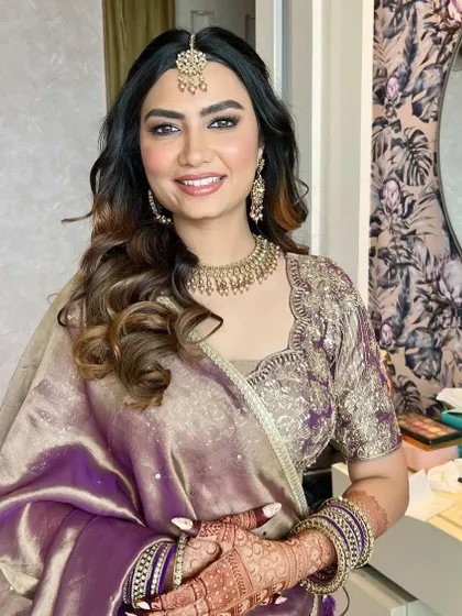 The complete look, with a beautiful smile. This engagement makeup is the perfect balance of glamour and elegance, designed to make the bride-to-be feel amazing.