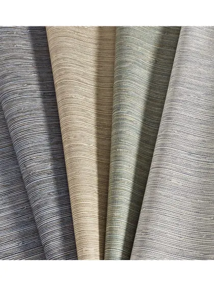 This 'Vinyl Shoreline Grass' wallpaper offers the beautiful, subtle texture of natural grasscloth but with the durability and ease of maintenance of vinyl. It's an excellent choice for high-traffic areas or spaces requiring extra resilience.