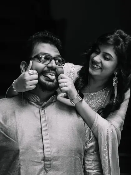 Poorva's playful expression and Pushkar's funny face make this black and white photo a perfect representation of their fun loving relationship.