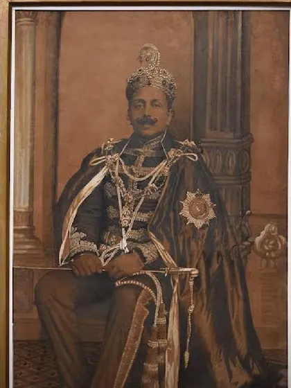 A striking photograph of Ananda Gajapati Raju by the pioneering 19th-century Indian photographer, Raja Deen Dayal. His work seamlessly merges the tonal richness of photography with the expressiveness of painting.