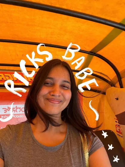 Ricks babe. A happy auto-rickshaw selfie with a simple text doodle.