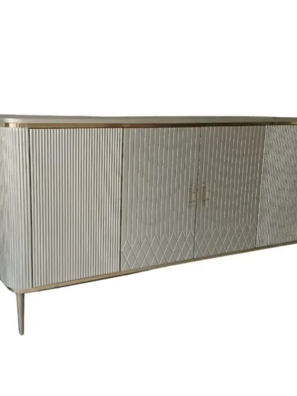 A clean, product-focused shot of our metallic buffet console against a white background. This view highlights the precise geometric patterns and sleek form of the piece.